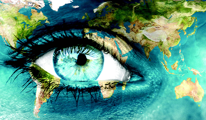 An open eye with the world map painted on the face