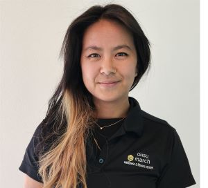 Picture of Rachel Suen with black march wellness polo shirt