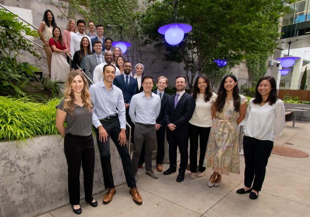 Group photo of residents and program faculty standing together smiling.