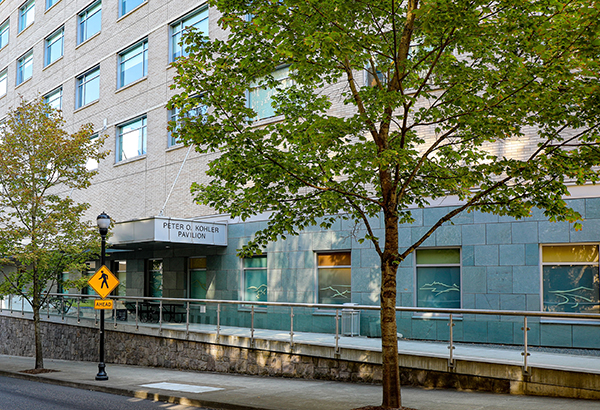 An external photo of the front entrance of Peter Kohler Pavilion on OHSU's Marquam Hill campus.