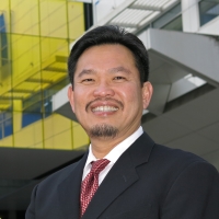 Headshot photo of Dr. David Huang