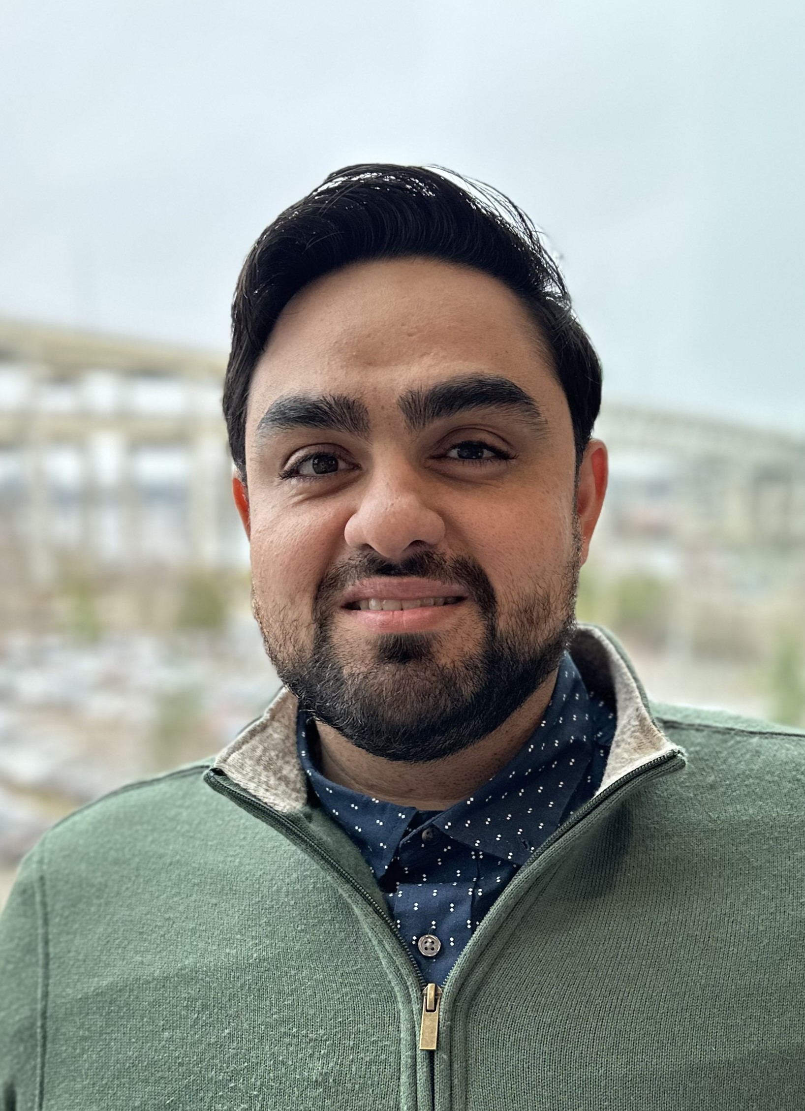 Headshot photo of Arslan Amer, Ph.D.