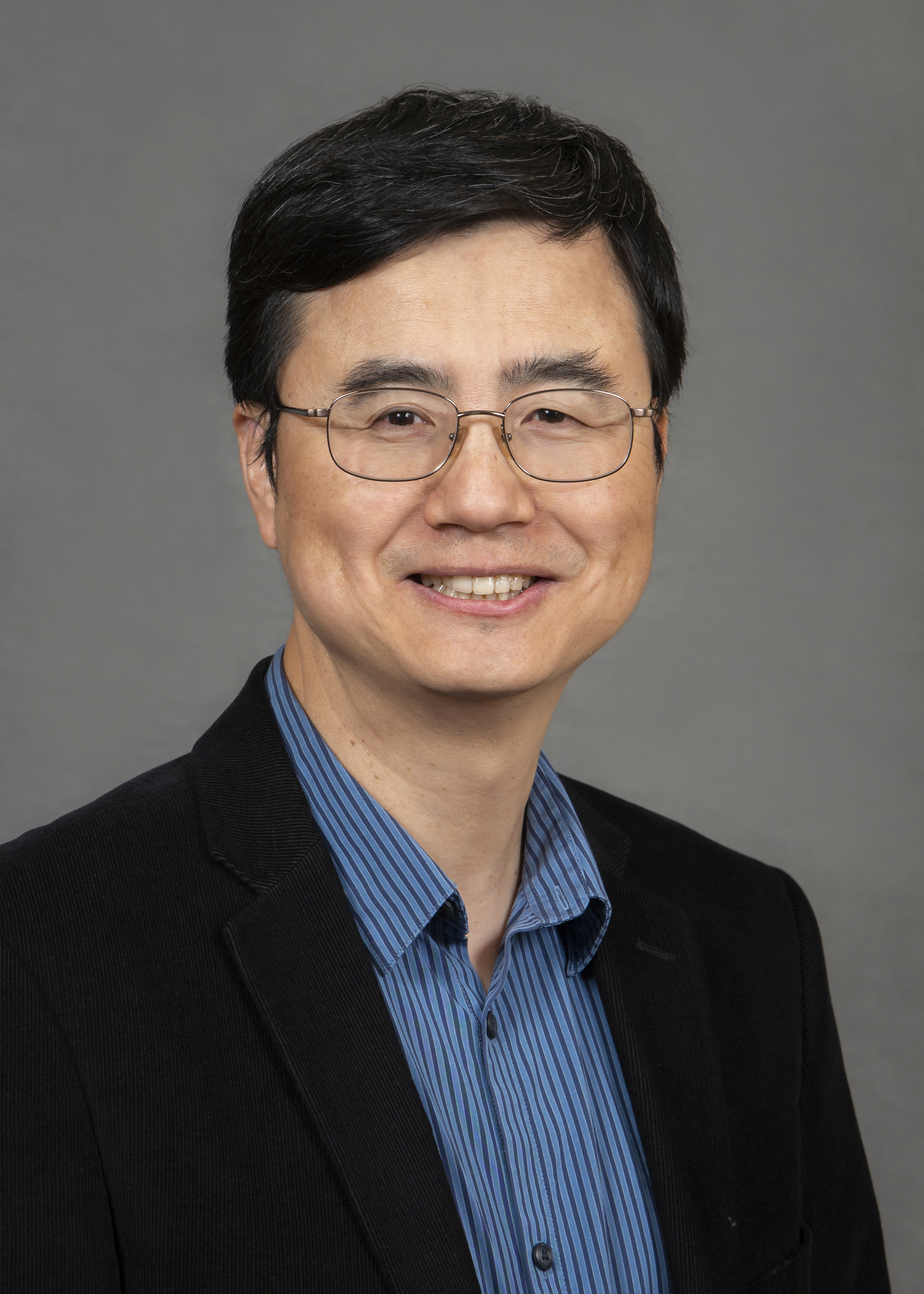 Headshot photo of Wenri Zhang, M.D., Ph.D.